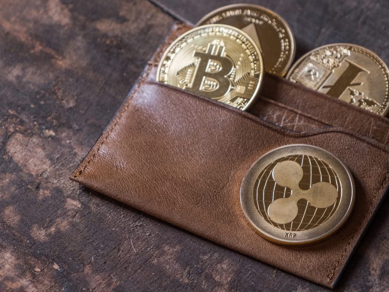 Popular,Cryptocurrency,In,Leather,Wallet,On,Wooden,Table,Top